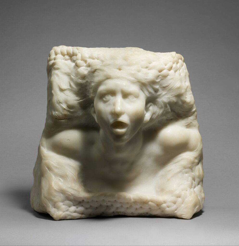 Marble sculpture of a distressed figure an anguished expression.
